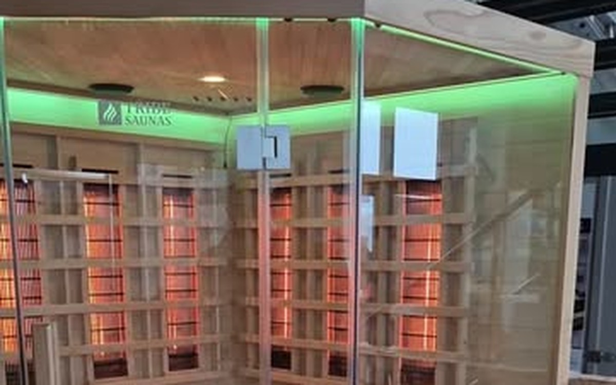The Athens corner infrared sauna in the Stove Fit showroom in Clonmel, heaters glowing